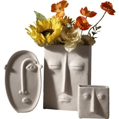 China Central Institute of Statistics Nordic Nordic creative ceramic vase dried flower decoration art face flower living room home decoration for sale