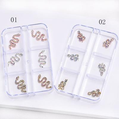 China Fashionable Metal Crystals Rhinestones For Nail Art Decorations DIY Alloy Nail Diamond Snake 3D Nail Art Charms for sale