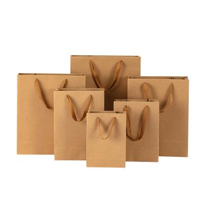 China Biodegradable Luxurious Brown Kraft Paper Bag Packaging For Gift Jewelry Retail Stores With Rope Handle for sale