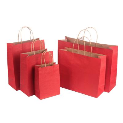 China Biodegradable Reusable Colorful Red Hanging Craft Paper Storage Bag Kraft Paper Bag With Low MOQ for sale