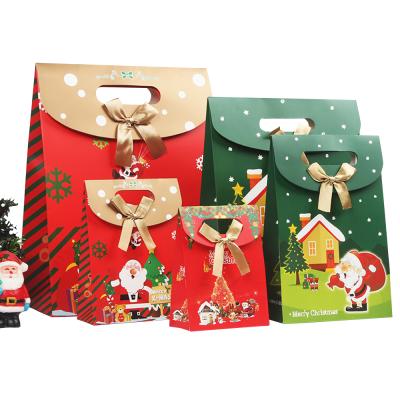 China Craft Mini Special Size Paper Pouch Wholesale Red Printing Recyclable Luxury Christmas Gift Christmas Shopping Paper Bags With Handle for sale