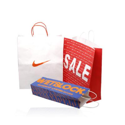 China Biodegradable Custom Luxury Printing Gift Bag Catering Kraft White Red Paper Recyclable Paper Bags With Your Own Logo for sale