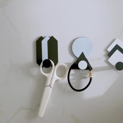 China Nordic Scandinavian style iron hook kitchen and bathroom geometric traceless hook kitchen bathroom and dormitory creative no hole iron hook for sale