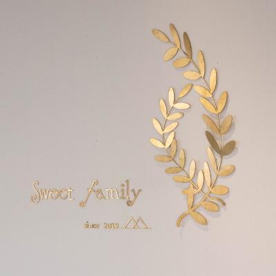 China Free Home Metal Background Wall Bedroom Decor Perforation Mordern Alphabet Olive Leaf Custom Pure Brass Olive Decoration Pure Brass for sale