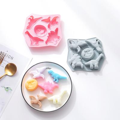 China Universal Viable Cartoon Dinosaur Shape 5-Cavity Kitchen Food Grade Silicone Animal Jelly Mold With Cake Mold for sale