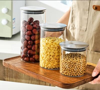 China 100% Sustainable High Borosilicate Round Food Storage Containers Glass Bottle Stainless Steel Lid Glass Jars For Home Kitchen Storage for sale