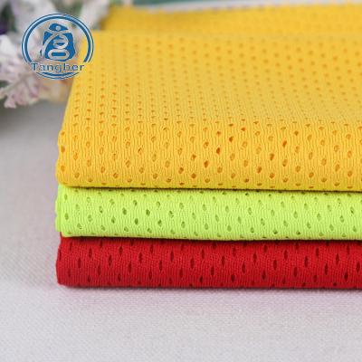 China Stain Repellent 100% Polyester Bird Eye Mesh Fabric Birds Eye Pique Knitted Sportswear Fabric Shirt Fabric Manufacturer for sale