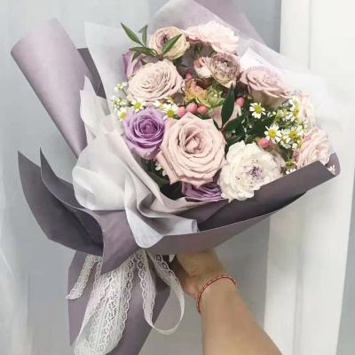 China Waterproof Milk Cotton Paper Florist Bouquets Wrapping Material Waterproof Flower Packaging for sale