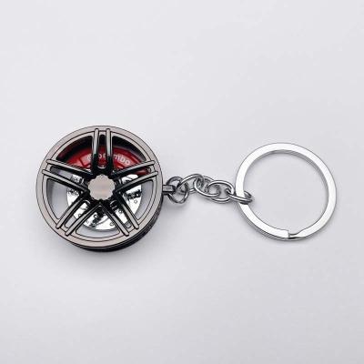 China Car parts promotion gift alloy modification chain wheel car tire main wheel hub auto part Keychains for sale