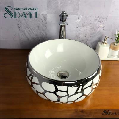 China Contemporary Round Ceramic Silver Color Wash Basin Bathroom Luxury Gold Color Painted Gold Sink for sale