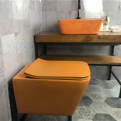 China New Design Hidden Cistern Bathroom Matte Orange Color Wall Hung Ceramic Rimless Toilet Square Matte Black Color WC Wall Hung Toilet for sale