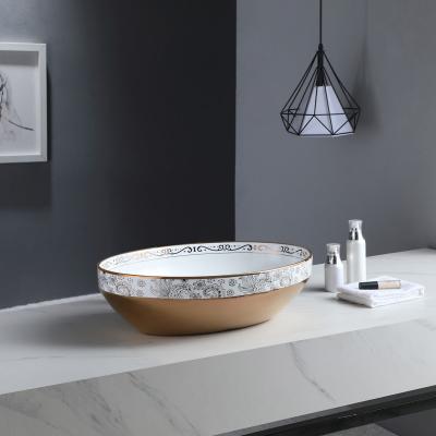 China Modern Ceramic Gold Hand Lavatory Ware Lavatory Bathroom Farmhouse Luxury Sanitary Sink for sale