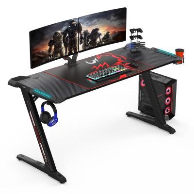 China Other Design Younger E-sports Equipment Extra Large Carbon Fiber Texture Top Professional Gaming Desk With RGB LED Lighting Effects for sale