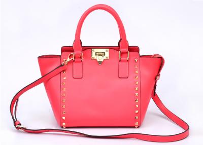 China Red Studded Ladies Leather Handbags trapeze bag with zipper / pocket for sale