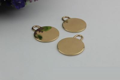 China Excellent quality zinc alloy light gold small flat round shape metal label plate for handbag for sale