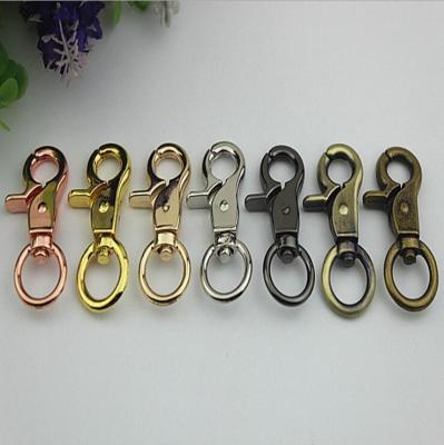 China OEM/ODM zinc alloy 13 mm round eye bolt metal dog leash lobster claw swivel snap hook rose for bag accessories for sale