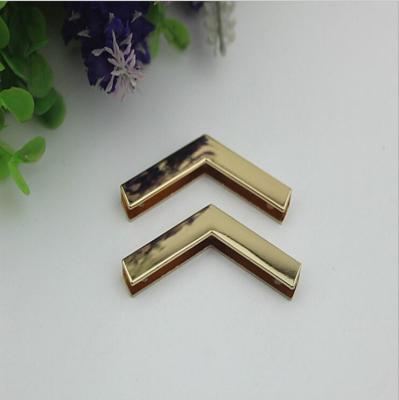 China Fancy simple design light gold metal accessory handbag decorative corner protectors for sale