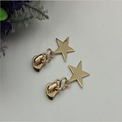 China Customized zinc alloy light gold purses 5# stars pattern zipper puller with slider for sale