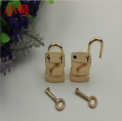 China High grade bag hardware light gold Chinese element key and decorative lock for sale