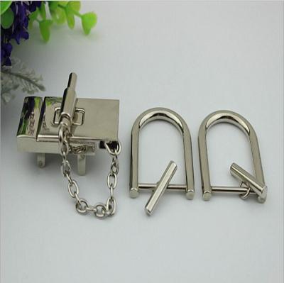 China Personality design three-piece suit silver color metal accessories zinc alloy rectangle bag locks for sale