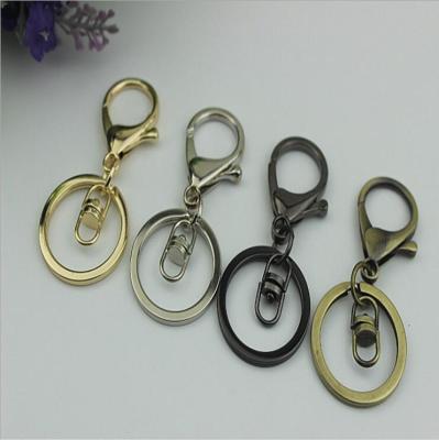 China High quality custom gold iron metal key ring zinc alloy snap hook with chain for gift keychains for sale