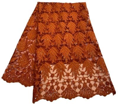 China Breathable Nigeria Fabric African Lace Fabric Water Soluble Brown Orange With Sequin Beads Swiss Lace Ladies Skirt for sale