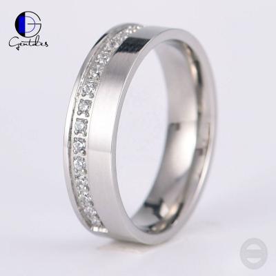 China Gentdes CLASSIC Jewelry Custom CZ Inlay Womens Stainless Steel Wedding Band Ring for sale