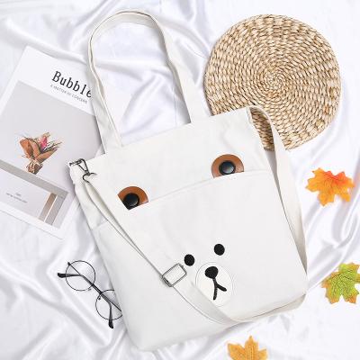 China Eco-Friendly Custom Canvas Student Logo Gift Bag Polyester Cotton Single Shoulder Portable Shopping Diagonal Bag for sale