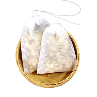 China Disposable Non Woven Tea Bag Drawstring Filter Bag Heat Sealing And Ironing Pouch for sale