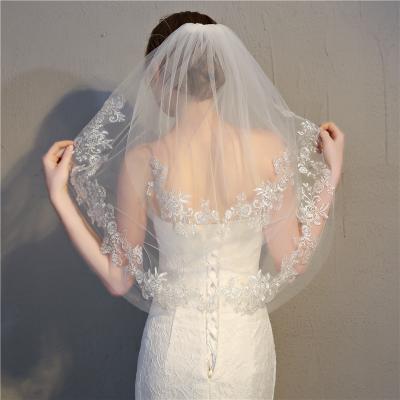 China Soft Silver Yarn Flower Tulle Bridal Veils 2 Tier Lace Fingertip Bridal Wedding Veils Short Flush Veils With Comb for sale