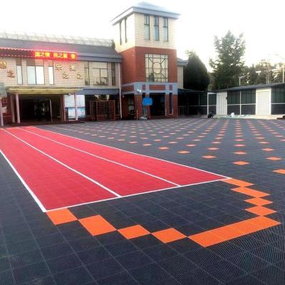 China Anti Slip Outdoor 100% New PP Interlocking Portable Sport Court Equipment Plastic Tiles Temporary Basketball Court Wooden Flooring for sale