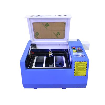 China Laser Engraving Fast Deliver 400*300mm CO2 40w/50W Engraving Laser Cutting Machine With USB PORT for sale