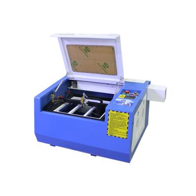 China Laser Engraving Fast Deliver 400*300mm CO2 40w/50W Engraving Laser Cutting Machine With USB PORT for sale