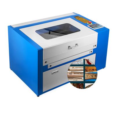 China Laser Engraving LCD Display 50w CO2 Laser Engraving Machine 300X500mm Sign Making for sale