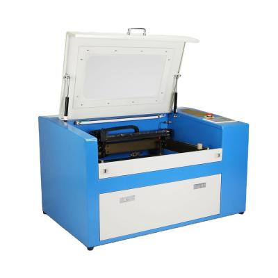 China Laser Engraving China Manufacturer 50W Laser Engraving Machine 500*300mm With Rotary Axis Laser Cutting Machine for sale