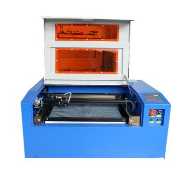 China Laser Engraving High Precision 40w/50w/60w 4040 CO2 Laser Engraving Machine Manufacture and Distributor for sale