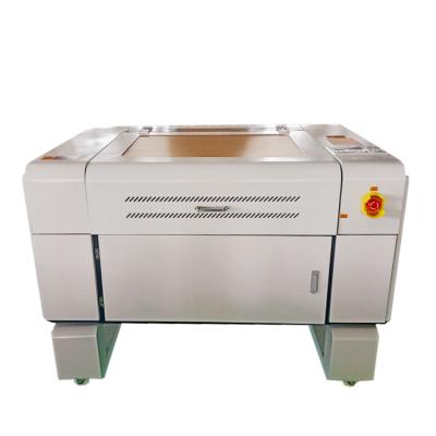 China Laser Engraving WATER COOLED 80W CO2 Laser USA PORT 700*500mm Laser MACHINE for sale