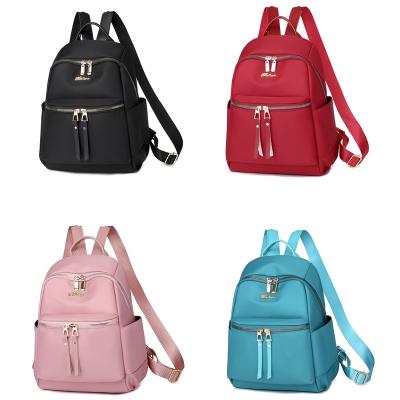 China Waterproof Multifunctional Portable Travel Bag Teenage Girl Backpack Schoolbag Badge Female Women Backpacks Small for sale