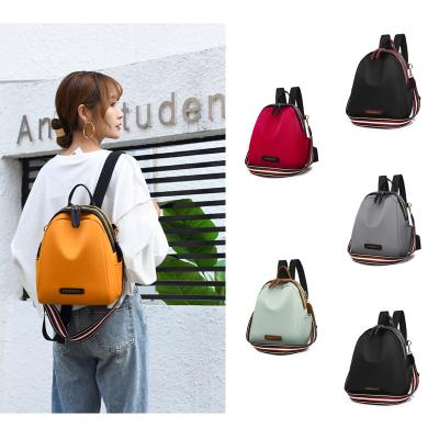 China New Waterproof Nylon Women Backpack Zipper School Bags For Teenagers Girls Small Pendant Backpack Female Multifunctional Backpack for sale