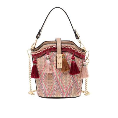 China Vintage Weave Women's Handbags 2021 New Retro Bucket Bag Straw Messenger Bags For Ladies Summer Bag One Main Woman for sale