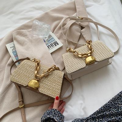 China 2021 New Summer Trend Vintage Gold Single Straw Mini Lock Shoulder Chain Purses and Purses for Women Single Armpit Cross - Body Handbag for sale