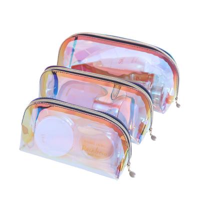 China Portable Women Clutch Makeup Bag Laser Travel Storage Laser Bags TPU PVC Colorful Transparent Waterproof Cosmetic Wash Bag for sale