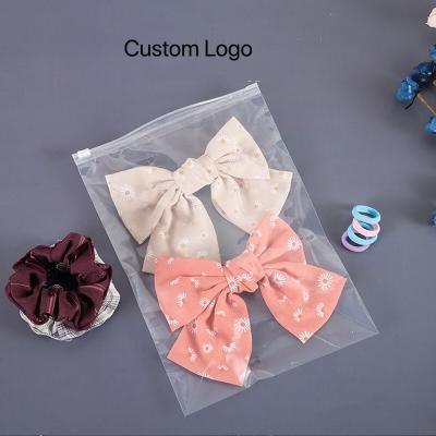 China Different Size Moisture Proof Printed SlideTransparent Plastic Zipper Bag For Clothing for sale