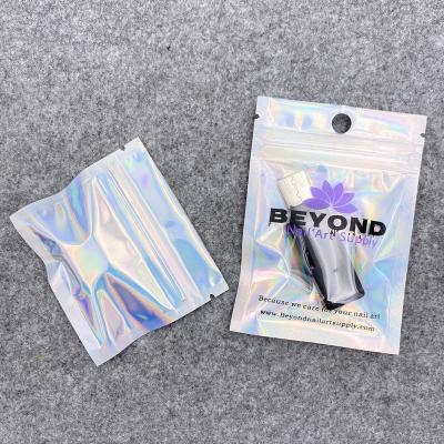 China Recyclable transparent clear iridescent front silver backed aluminized plastic packaging mylar laser ziplock holographic bag for sale