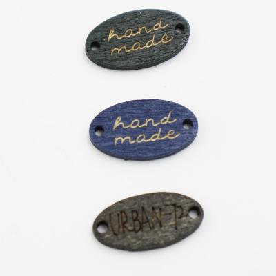 China Sustainable Oval Wood Buttons 2 Holes Sewing Crafts Accessories with 'Hand Made' Lettering for sale