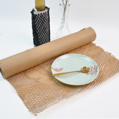 China Biodegradable Shockproof Hexagonal Structure Honeycomb Cushion Kraft Paper Roll Wrapping For Cushioning for sale