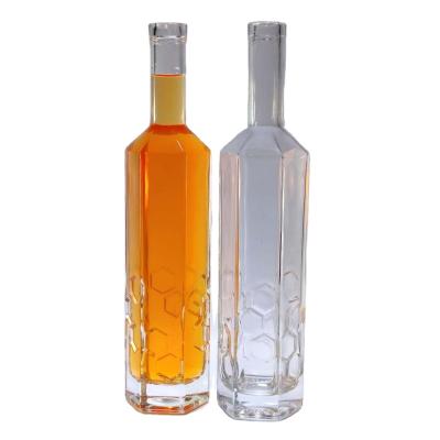 China 1000ml Eco-friendly Design Recyclable Private Hexagon Shape Honey Water Decals For Vodka Whiskey Rum Gin Tequila Brandy Glass Bottles With Lids for sale