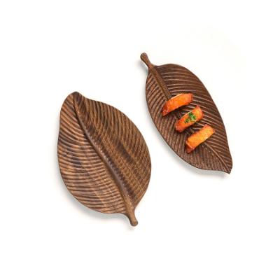 China Sustainable Walnut Vintage Leaf Shape Tray Black Dinner Fruit Supply Eco Friendly Snack Seving Wooden Dish With Handle for sale