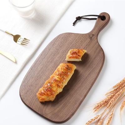 China Mini Bulk Epoxy Resin Cutter Food Supplement Tray Sushi Head Tilt Walnut Bread Cheese Stocked Wooden Chopping Board for sale