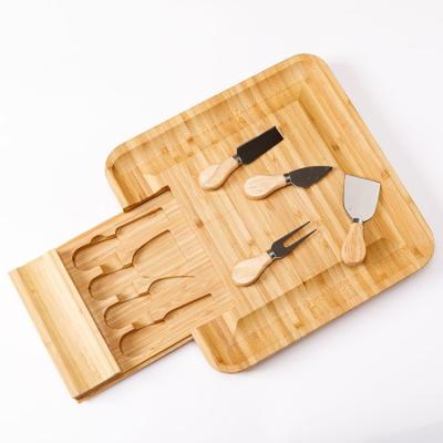 China Silian Live Edge Bamboo Wholesale Cutting Viable Cheese Board with Knife Cutlery Set for sale